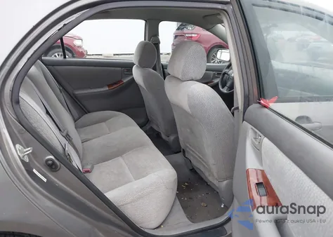 2004 Toyota Corolla Le z USA, uszkodzony, nr VIN 2T1BR32E94C260871